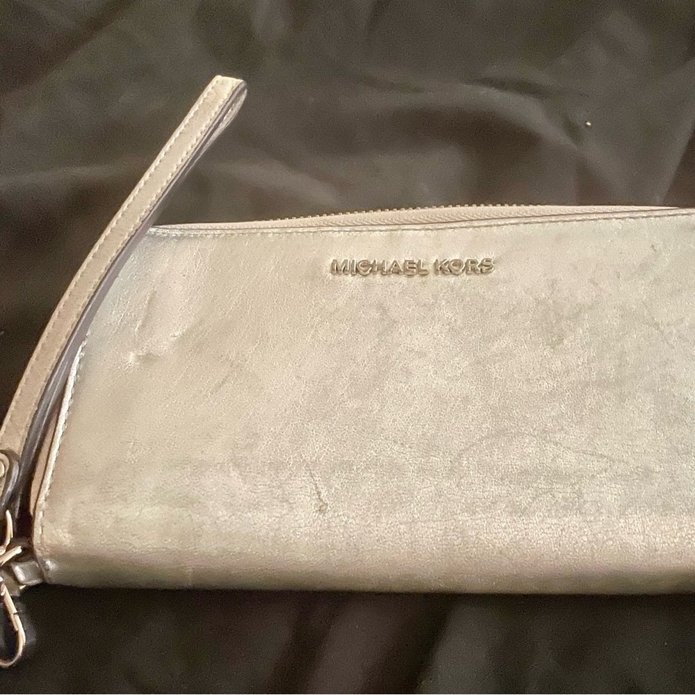 Micheal Kors silver metallic wristlet